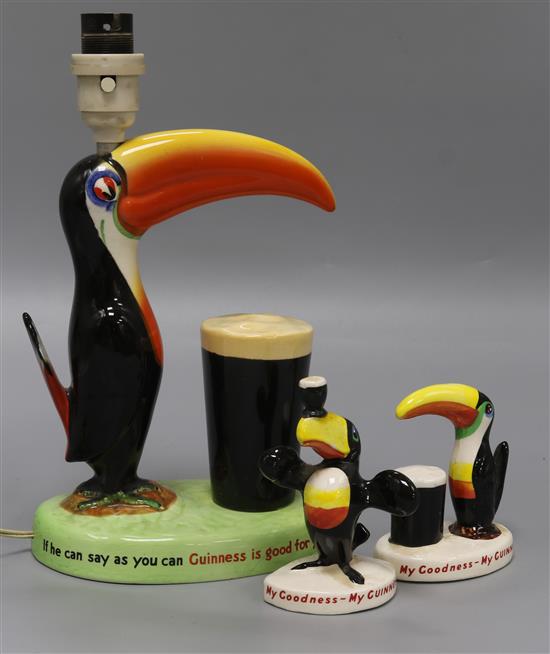 A Carlton ware Guinness advertising toucan lamp base and two similar figures lamp height 29cm